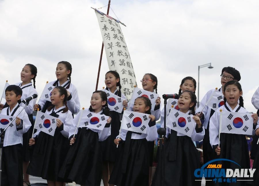 韓國民眾光復(fù)節(jié)前集會紀(jì)念新故慰安婦抗議日本（圖）