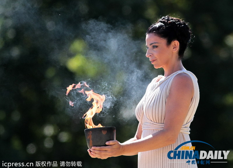索契冬奧會希臘采集圣火火炬?zhèn)鬟f啟動開幕倒計(jì)時